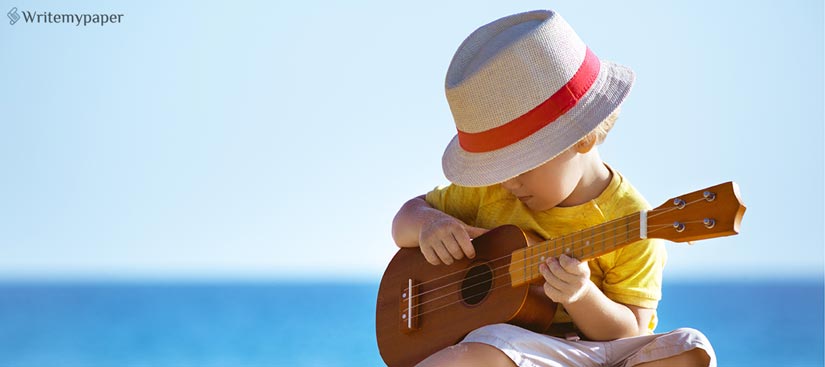 Little Boy Playing Guitar